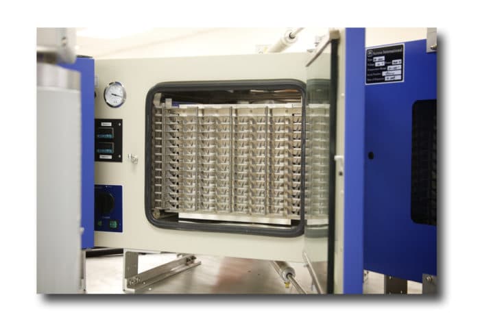 Fully automated vacuum ovens with temperature and vacuum pressure under program control.